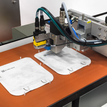 NX-B Rotary Sealer with printstation 