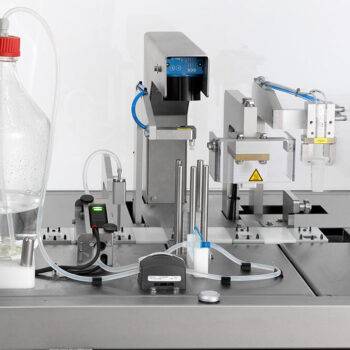 Liquid filling - intra ocular lens packing machine