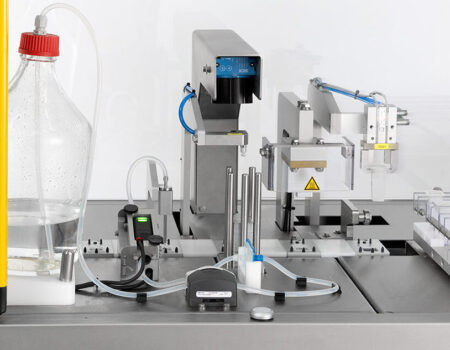 Liquid filling - intra ocular lens packing machine