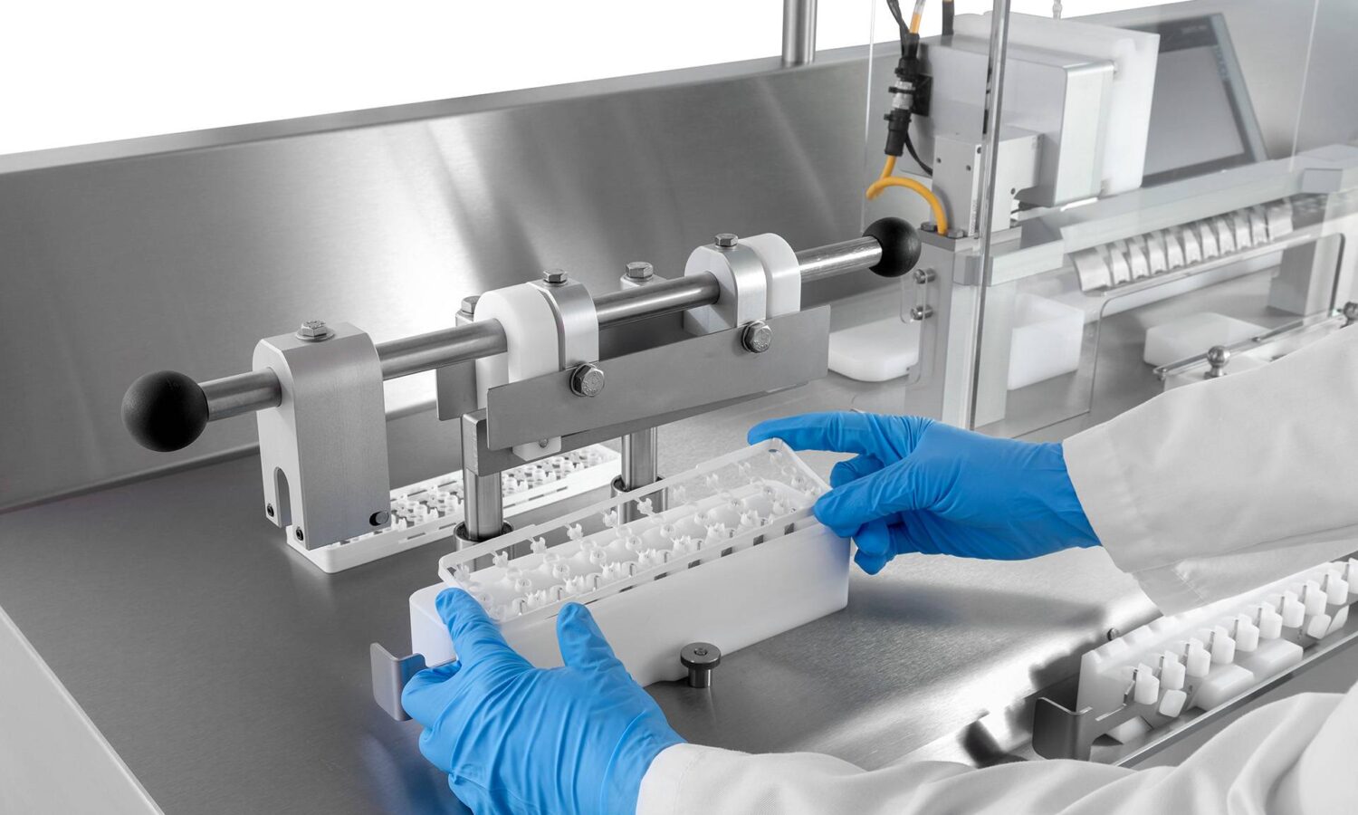 Semi-automatic assembly machine eye drop device | GTE Engineering